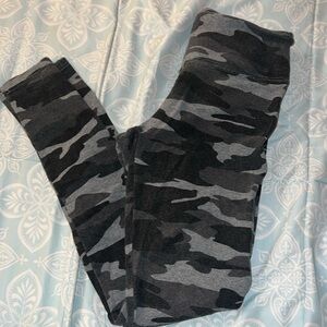 Medium size black and grey camo leggings